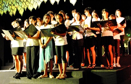 Turn the World Around and The Rising of the Moon, performed by the GIS choir.